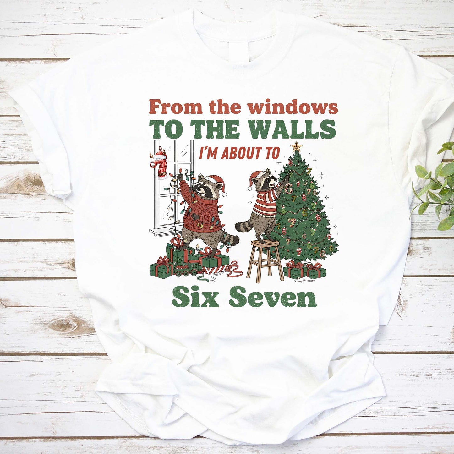 Funny Christmas Hoodie with Raccoons Decorating Tree and 'Six Seven' Text