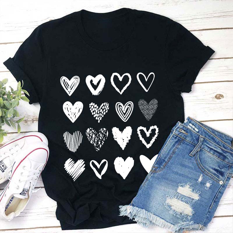Black T-Shirt with Unique White Hand-Drawn Heart Designs - Casual Graphic Tee