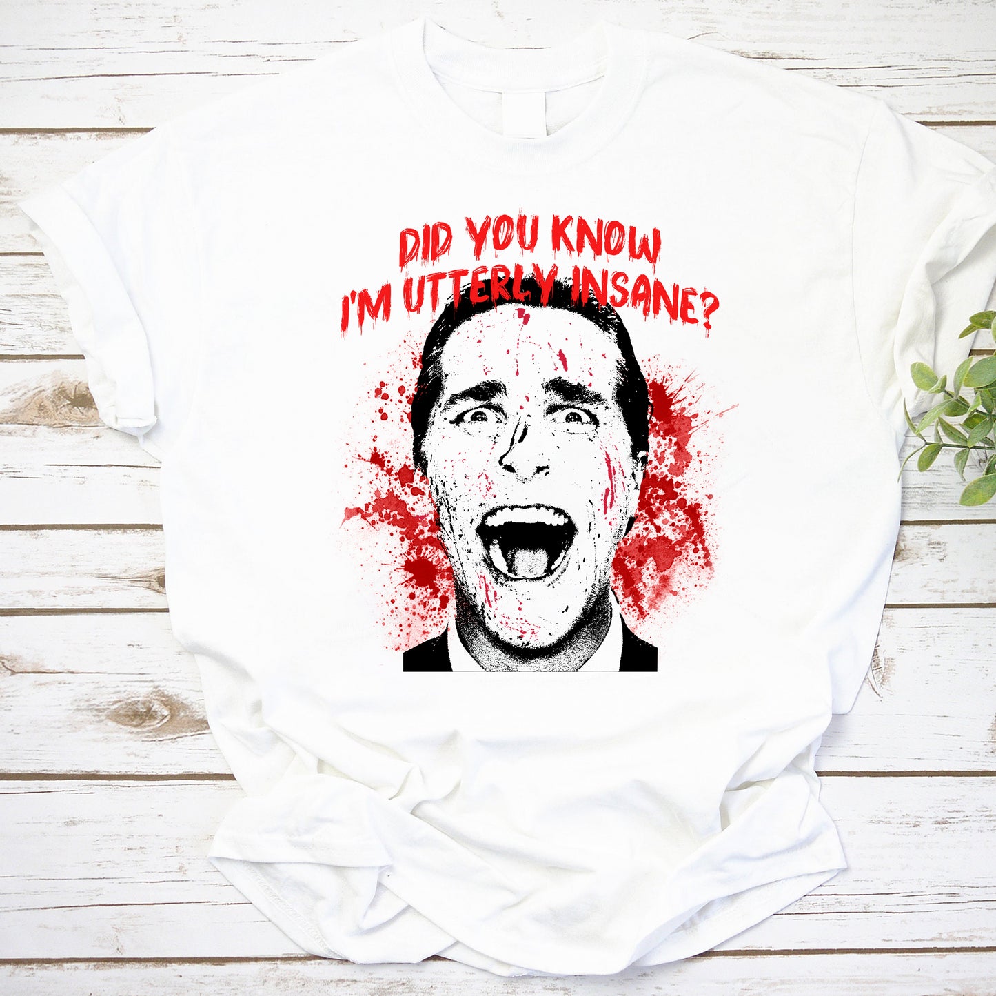 Utterly Insane Blood Splatter Face Graphic Tee for Horror Fans