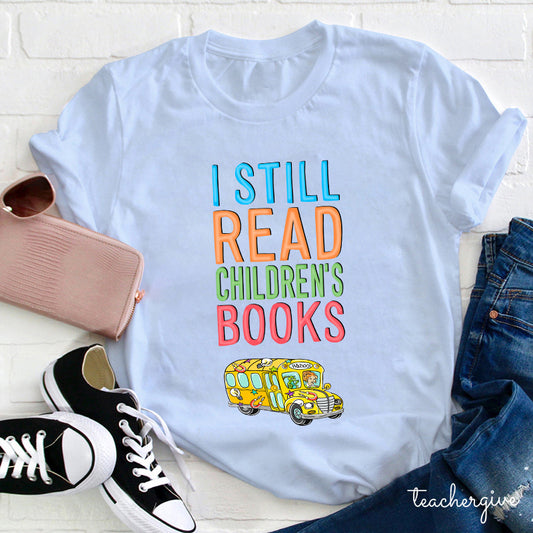 I Still Read Children's Books Funny Teacher Shirt with School Bus Graphic