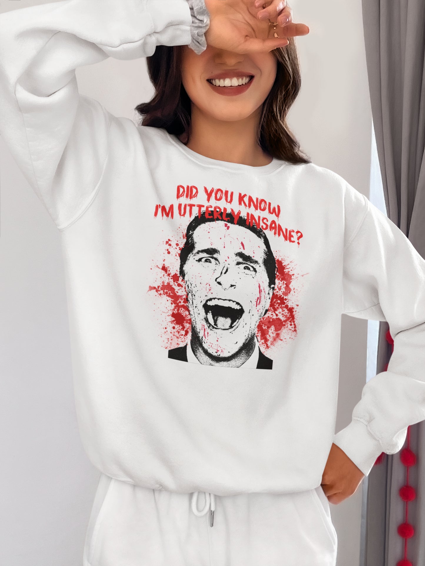 Utterly Insane Blood Splatter Face Graphic Tee for Horror Fans