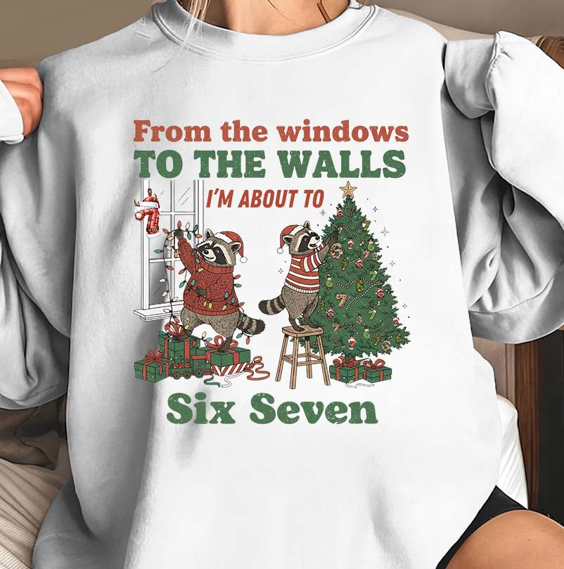Funny Christmas Hoodie with Raccoons Decorating Tree and 'Six Seven' Text