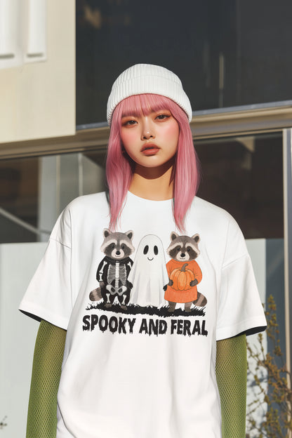 Spooky and Feral Halloween Hoodie with Cute Raccoon and Ghost Design